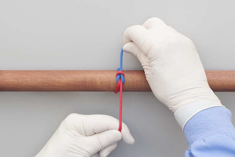 One Handed Surgical Tie, Pulling Surgical Tie using the Pulling
